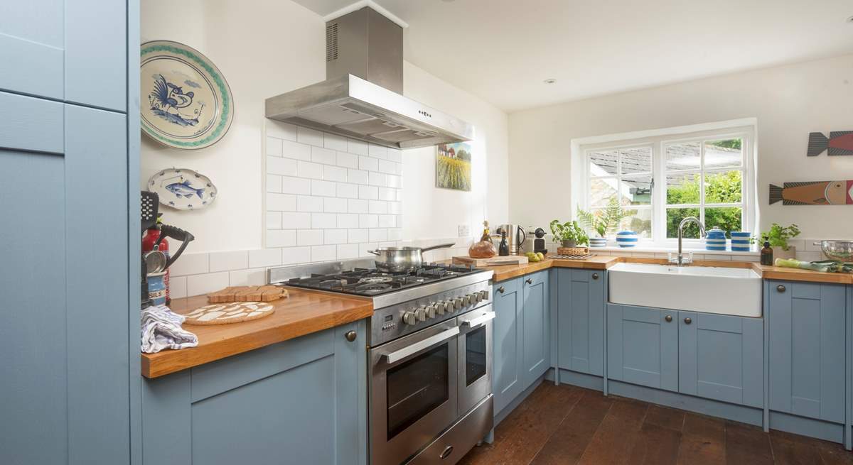 This kitchen is adjacent to the dining area, giving a social vibe.