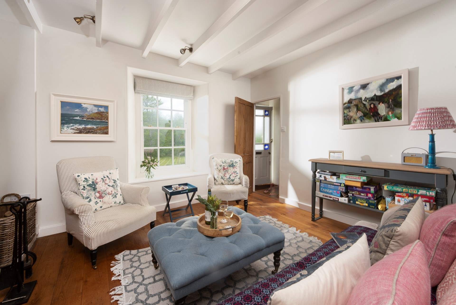 This sitting-room has plenty of games to enjoy.