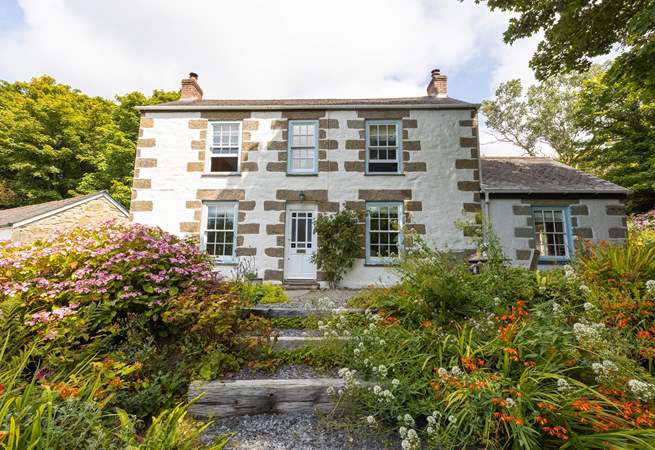 This charming farmhouse is perfect for a getaway with family and friends. 