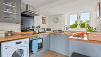 Back in the house, the kitchen is fully equipped with everything you will need to whip up that special meal.