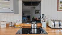 Chef will enjoy whipping up any feast in this lovely kitchen area.