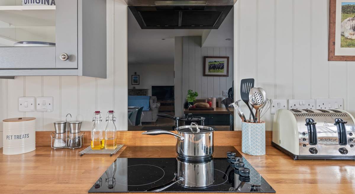 Chef will enjoy whipping up any feast in this lovely kitchen area.