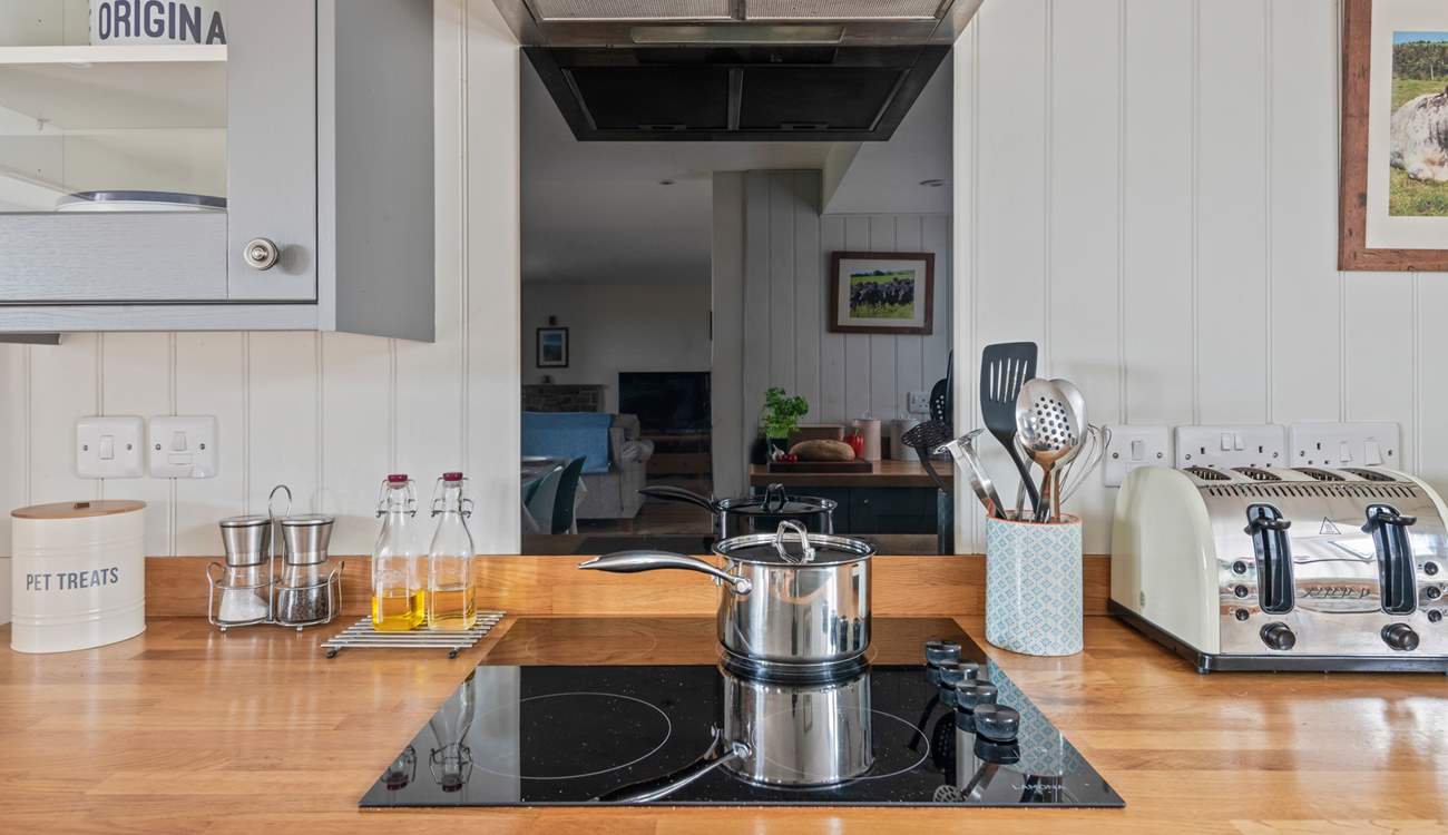 Chef will enjoy whipping up any feast in this lovely kitchen area.