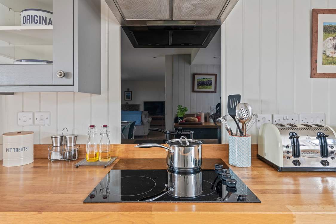 Chef will enjoy whipping up any feast in this lovely kitchen area.