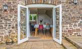 Step out of the dining area onto your patio. - Thumbnail Image