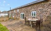 Dining al fresco is such a treat in this large patio area. - Thumbnail Image