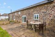Dining al fresco is such a treat in this large patio area.