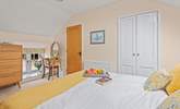 On the first floor, bedroom 1 is home to this beautiful king-size bed. - Thumbnail Image