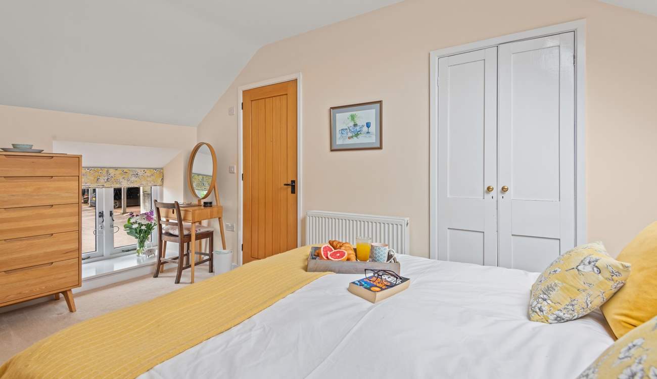 On the first floor, bedroom 1 is home to this beautiful king-size bed.