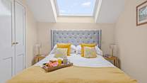 Bedroom 1 offers this beautiful king-size bed.