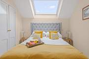 Bedroom 1 offers this beautiful king-size bed.