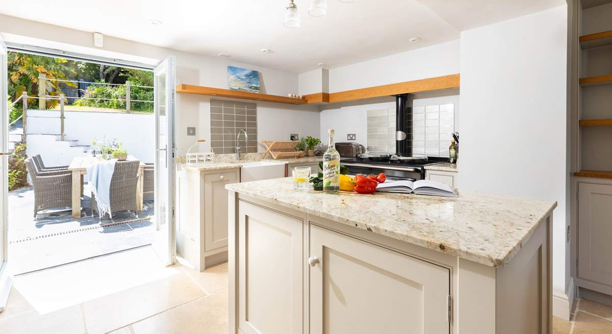 Enjoy the sunshine beaming into the beautiful kitchen/dining area.