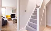 The steep cottage staircase leads up the bedrooms. - Thumbnail Image