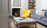 Step inside the sitting-room to relax in front of the cosy wood-burner. - Thumbnail Image