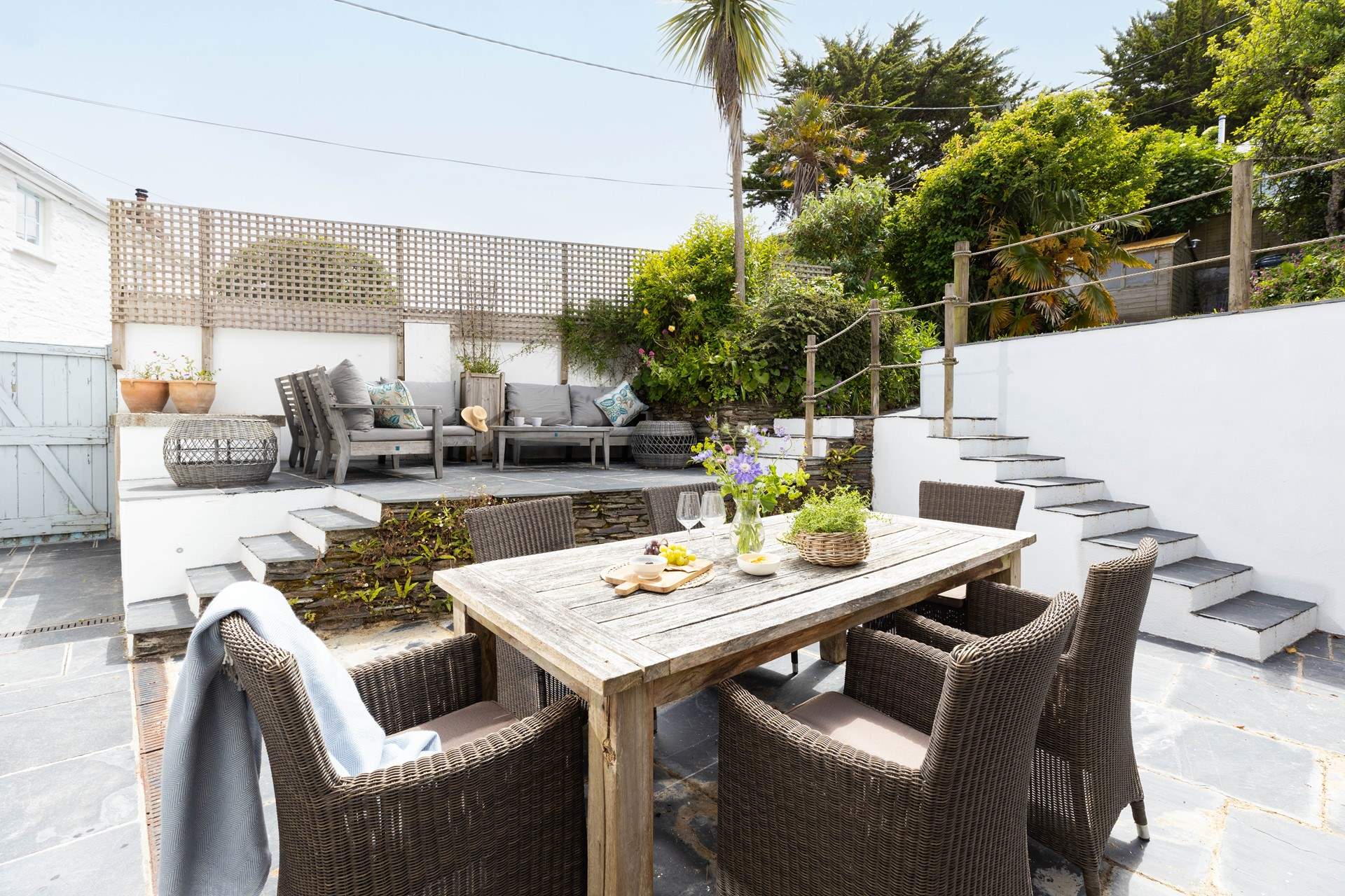 The outside space has plenty of seating for al fresco dining or just lounging with a book.