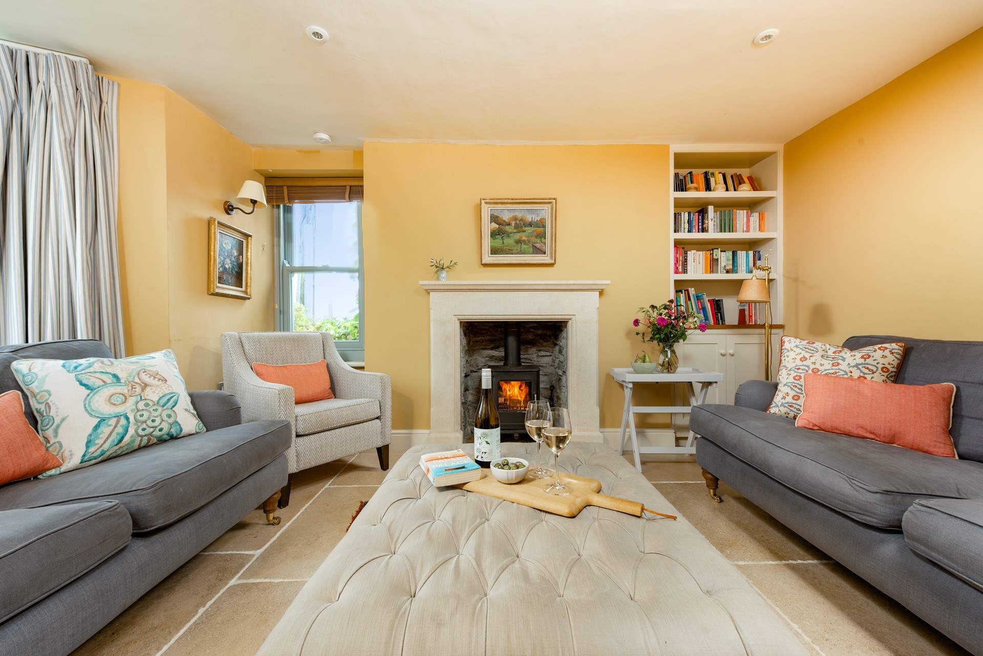 This charming room has comfy sofas, perfect for an evening of relaxation after a busy day exploring. 