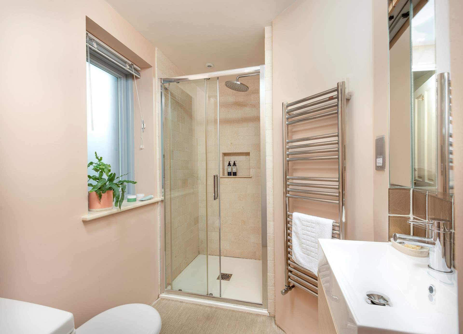 The en suite shower room for bedroom 1.