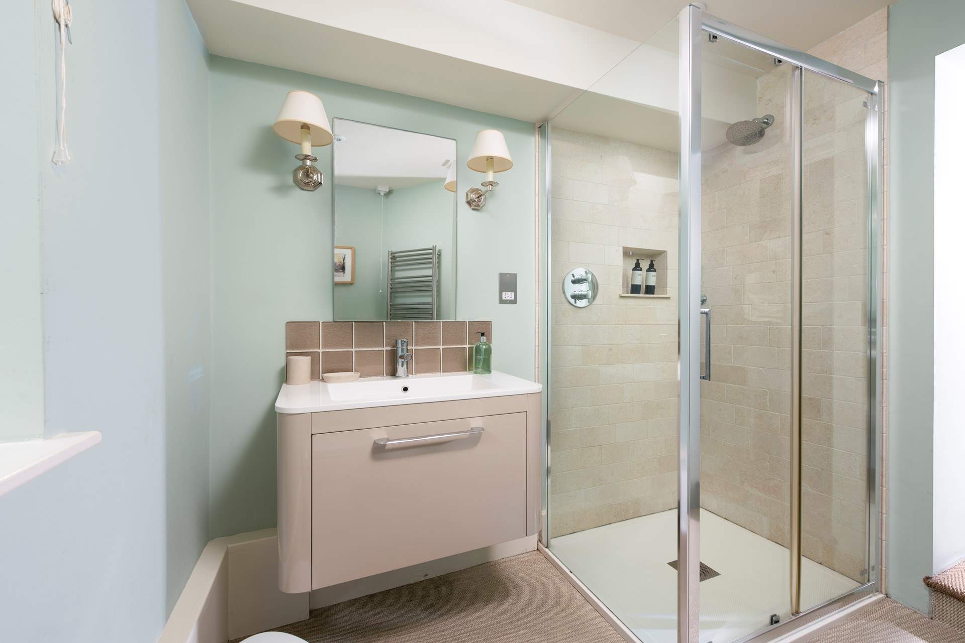 The stylish en suite shower room to bedroom 3.