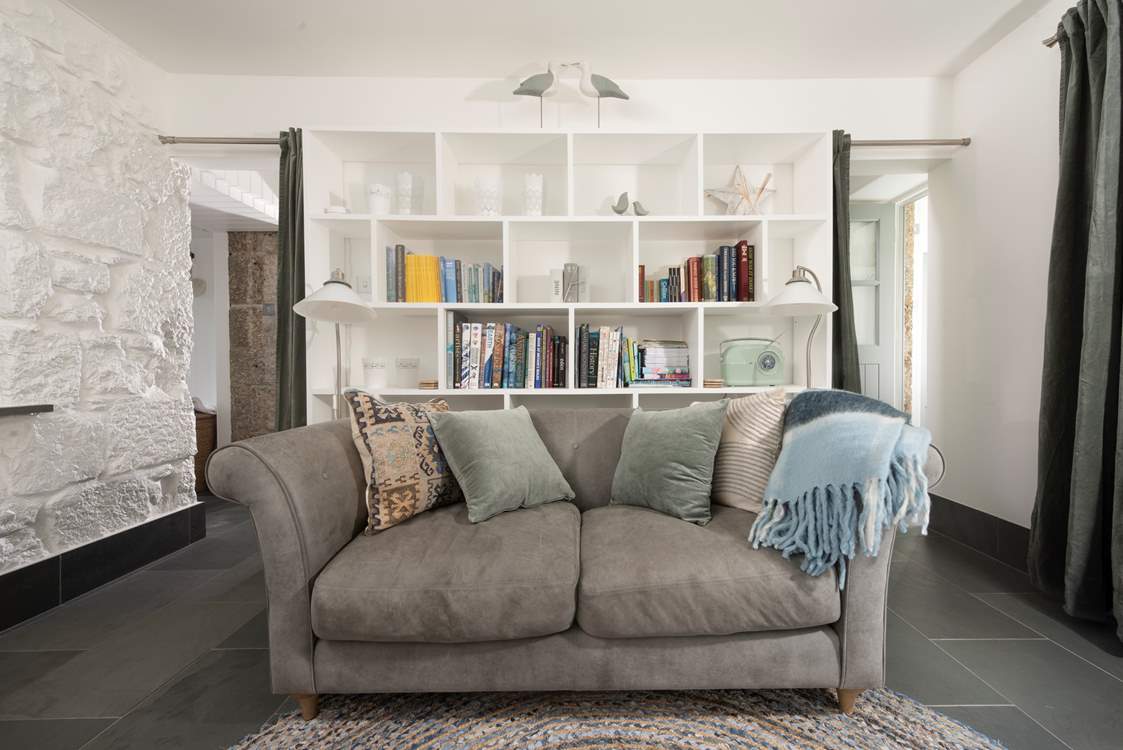 Luxury soft furnishings adorn this cosy cottage.