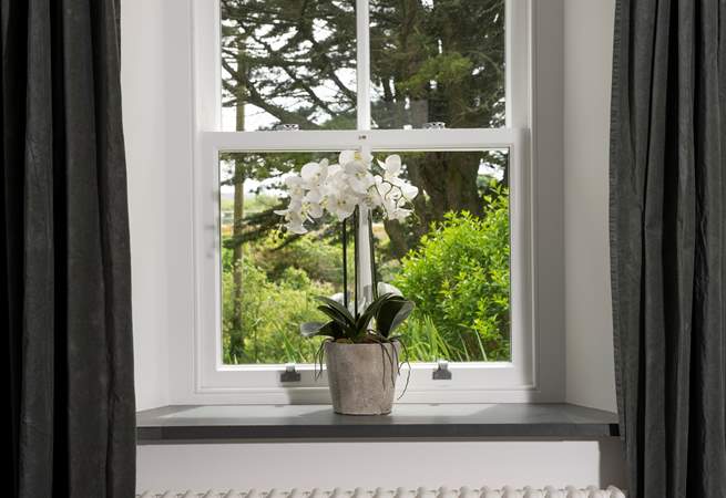 The cottage has wraparound gardens, viewed from every window.