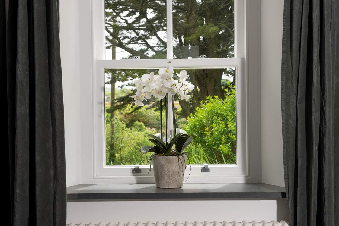 The cottage has wraparound gardens, viewed from every window.