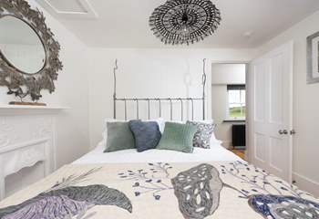 Gorgeous bedroom 1 with its crisp fresh designer linens.