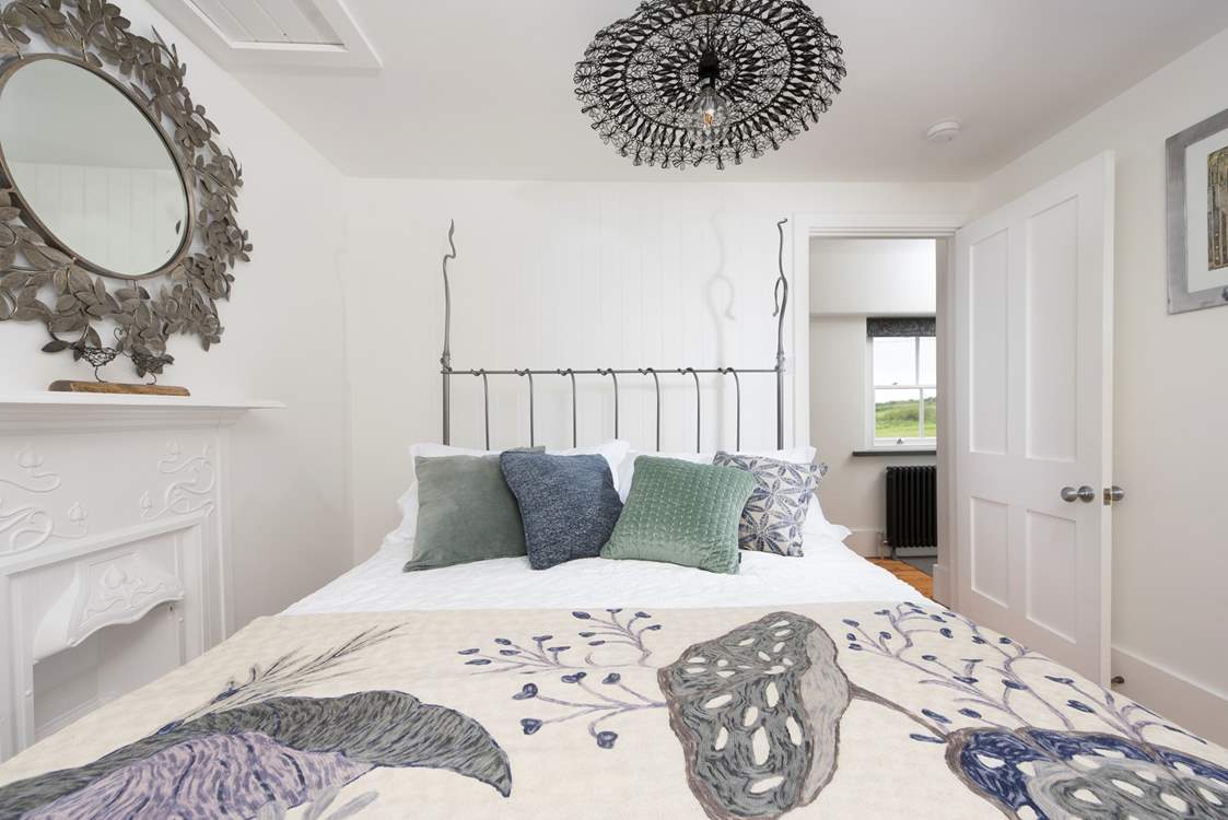 Gorgeous bedroom 1 with its crisp fresh designer linens.