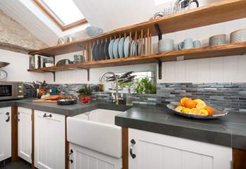 Artisan crockery and cookware emphasise the quality of this outstanding property.