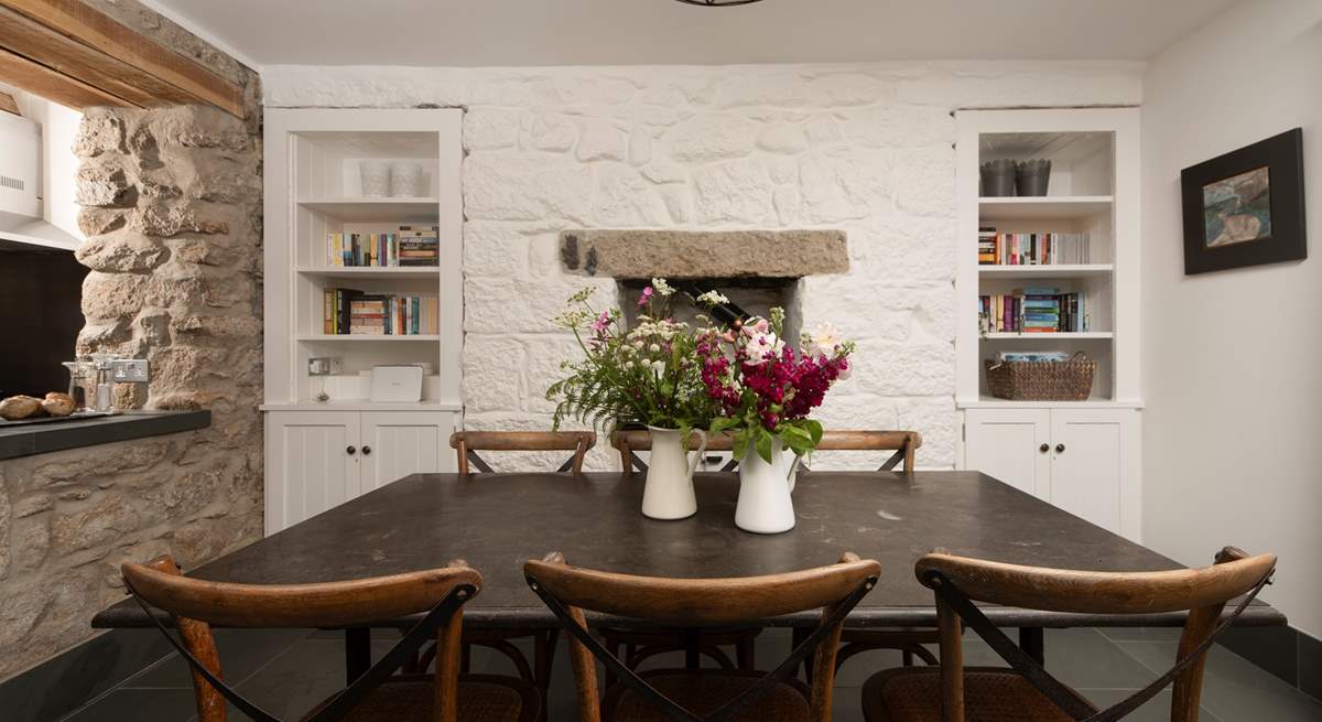 A charming sociable slate dining-table, many stories will be shared here.