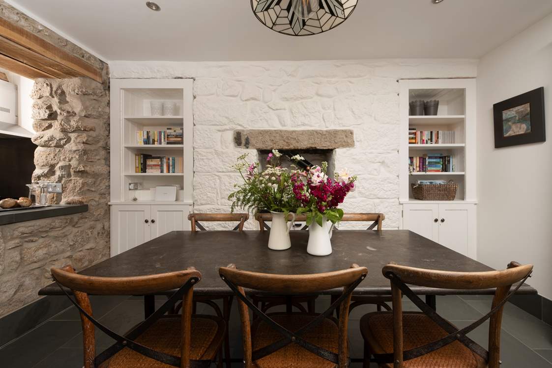 A charming sociable slate dining-table, many stories will be shared here.