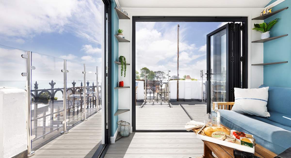 The sun-room tops off the accommodation - with its views it's bound to be a popular spot!