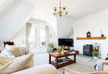 The sitting-room overlooks the village and the sea beyond.