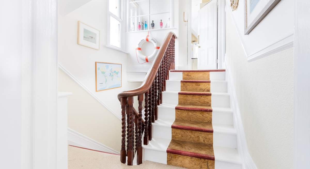 And from here a few more steps lead you to the kitchen, the next two bedrooms and the living space.