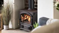 Warm your toes in front of the wood-burner.