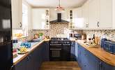 The cook will just love this pretty kitchen. - Thumbnail Image