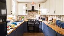 The cook will just love this pretty kitchen.