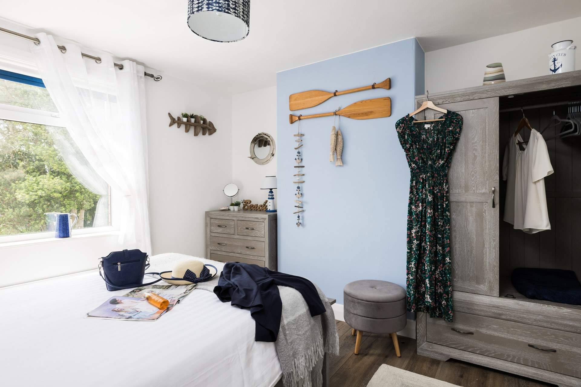 Getting ready for a fun day out in this sunny bedroom.