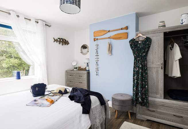 Getting ready for a fun day out in this sunny bedroom.