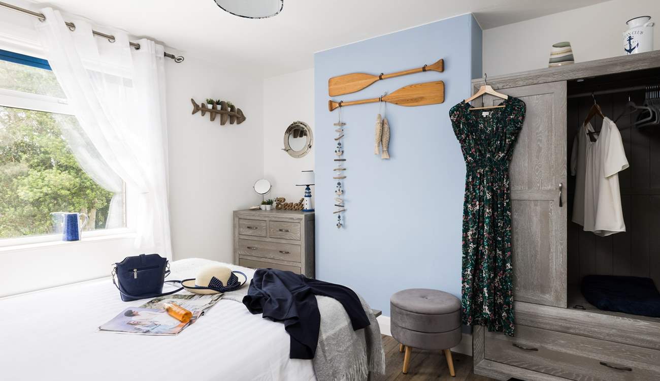 Getting ready for a fun day out in this sunny bedroom.