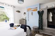 Getting ready for a fun day out in this sunny bedroom.