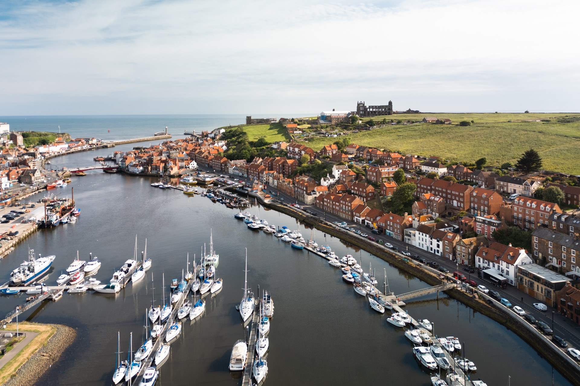 Iconic Whitby Abbey sitting high above the cliffs. 