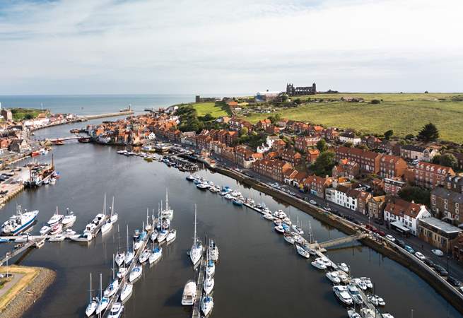 Iconic Whitby Abbey sitting high above the cliffs. 