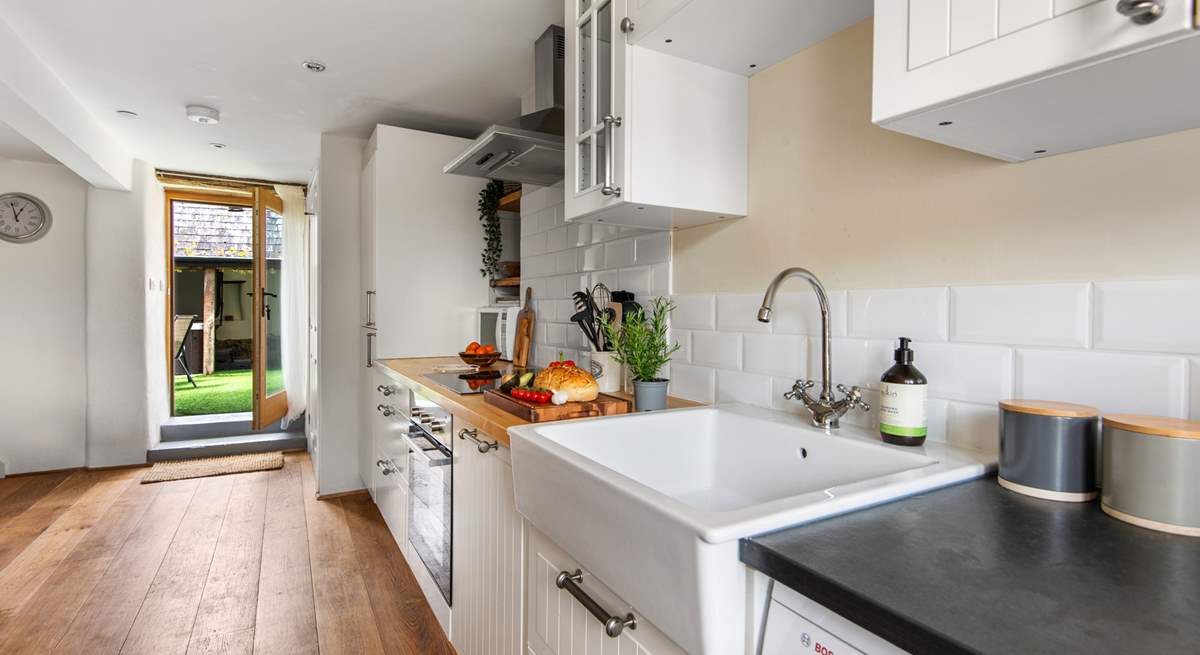 The kitchen leads out into the courtyard. Perfect for  serving up al fresco treats.