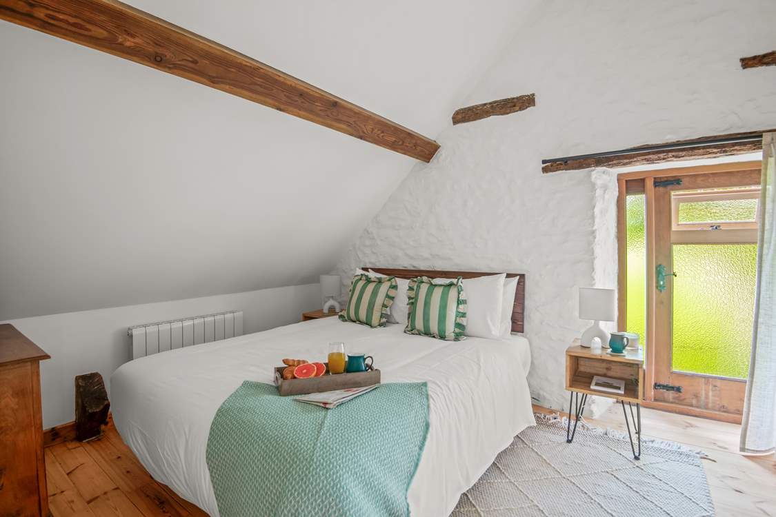Bedroom 5 is a charming king-size bedroom.