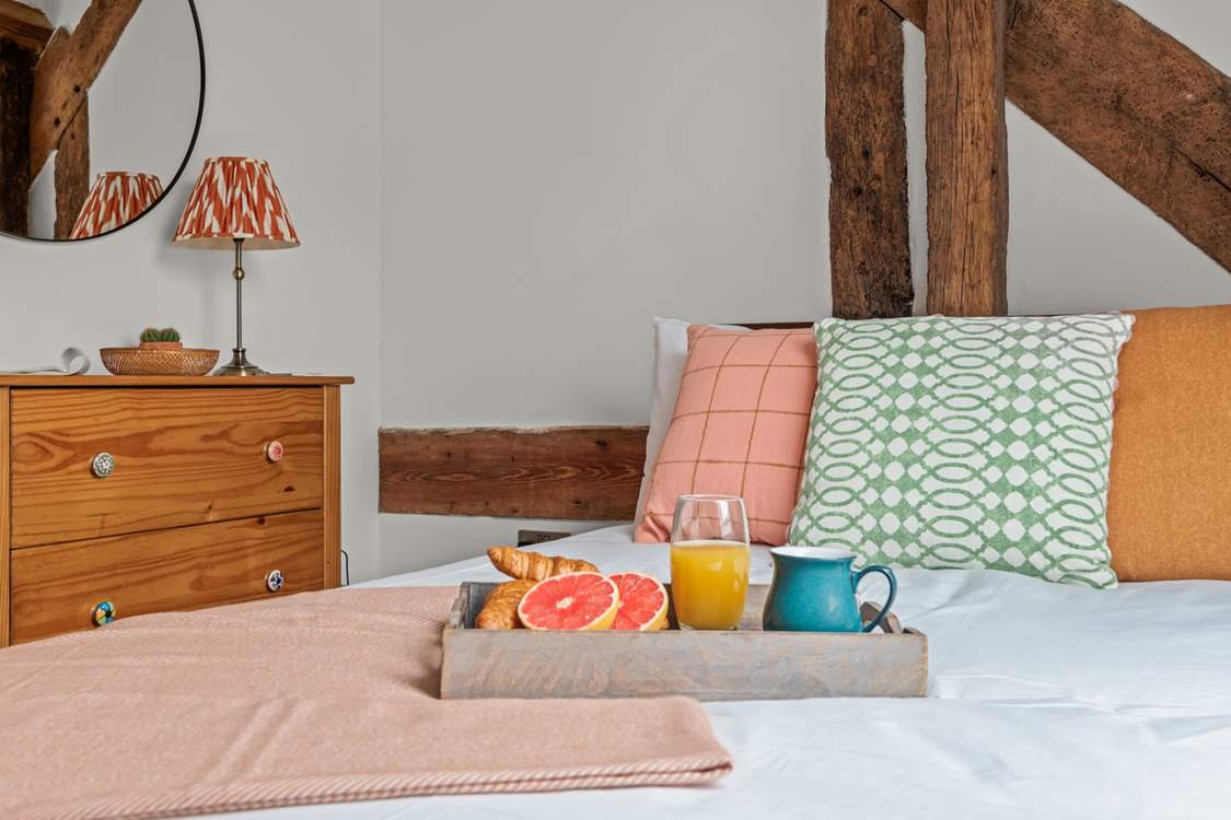Once again, this beautiful bedroom oozes colour and comfort.