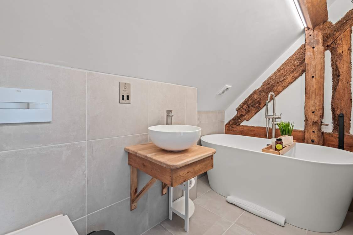 The family bathroom is home to this wonderful bath tub.