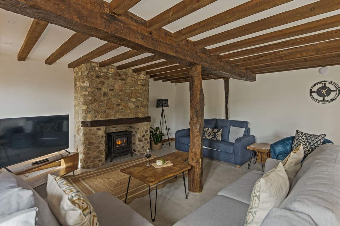 The wood-burner effect electric stove gives instant heat and glow, perfect for those chillier evenings.