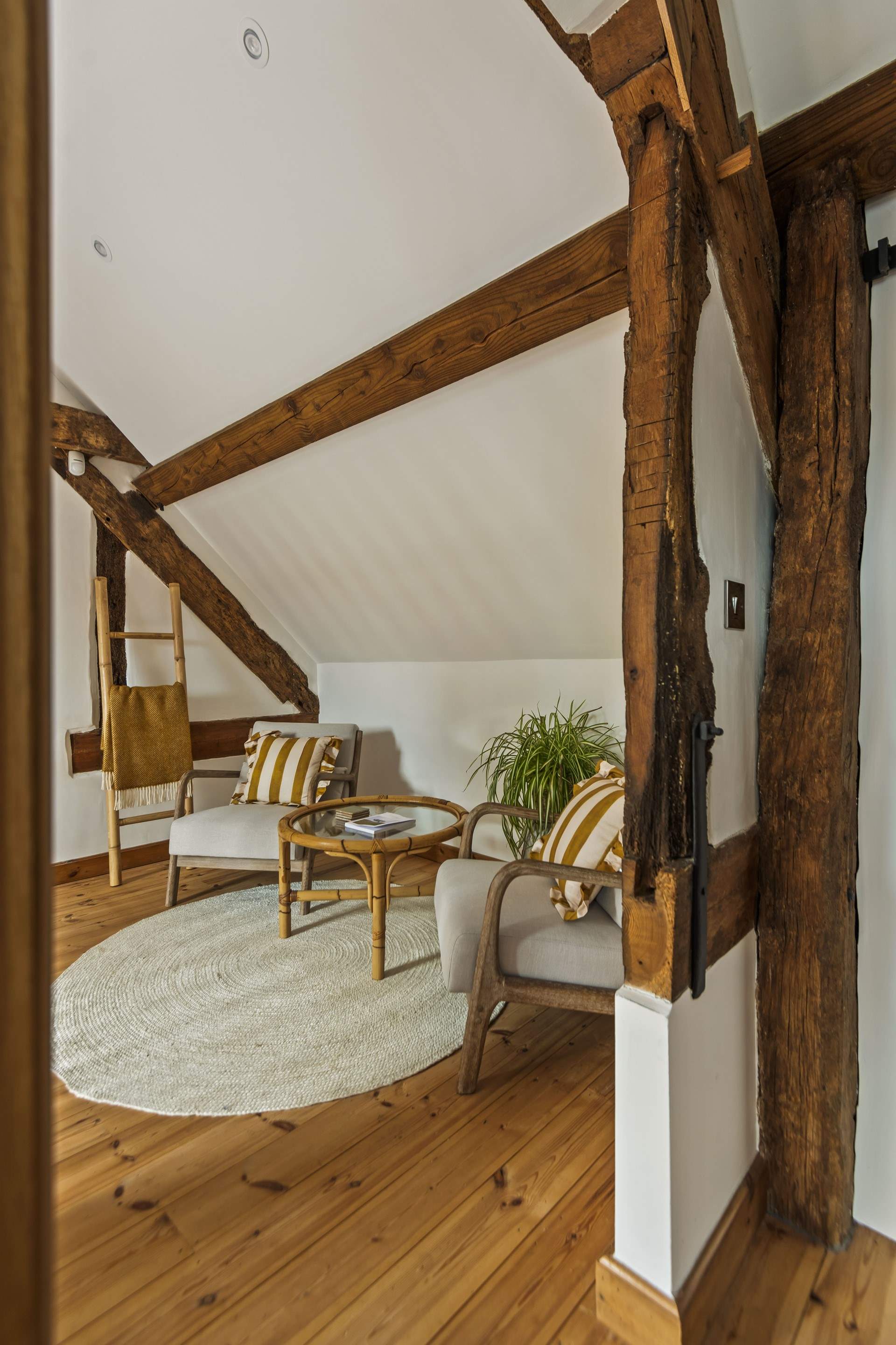 The first floor landing provides a great spot to relax and enjoy a book or your morning coffee.