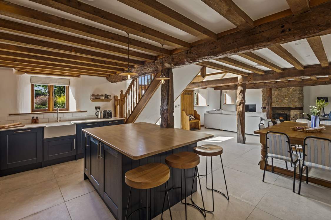 The open plan setting is perfectly designed for the whole party to dine, play and relax together.