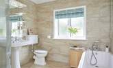 The family bathroom is well appointed with bath and separate shower cubicle. - Thumbnail Image